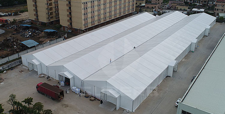 Can inflammable and damp goods be placed in industrial storage tents?