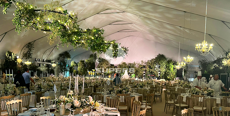 An elegant and grand outdoor tent wedding